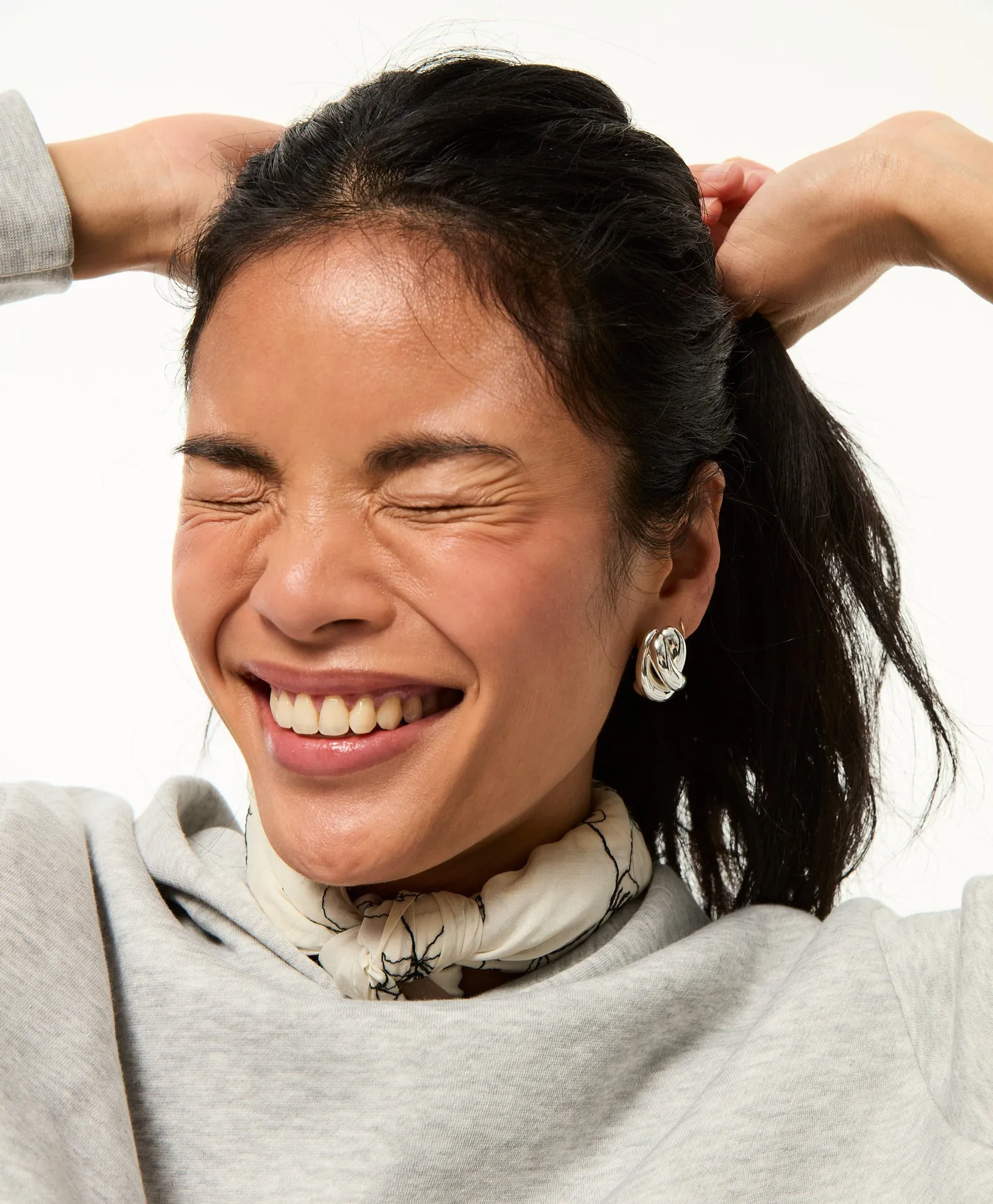 The Knot Earrings in Silver sold by Roxanne Assoulin product image thumbnail 2