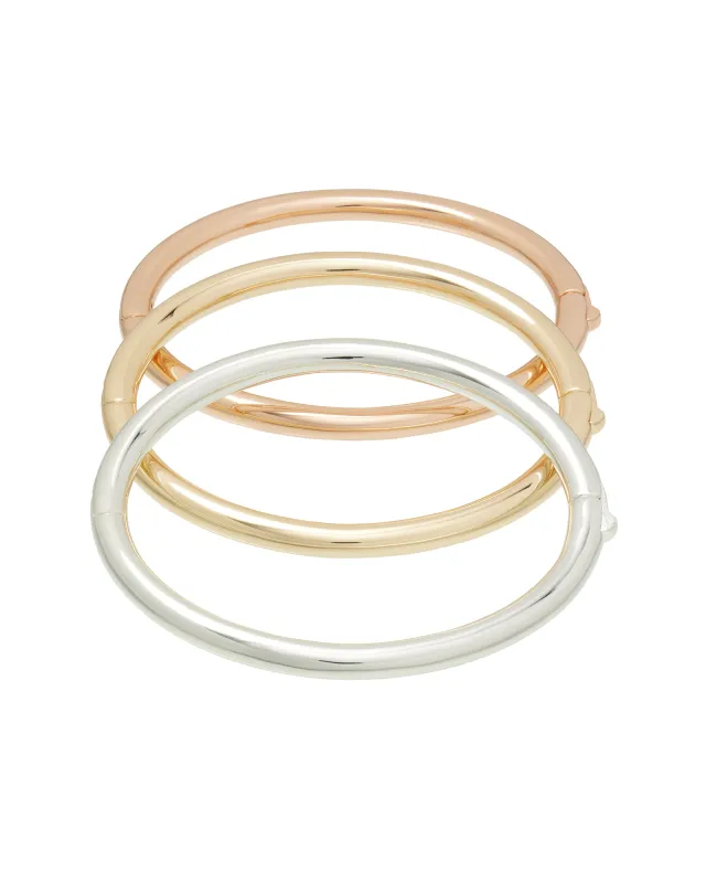 The Tubular Hinged Bracelet Trio sold by Roxanne Assoulin