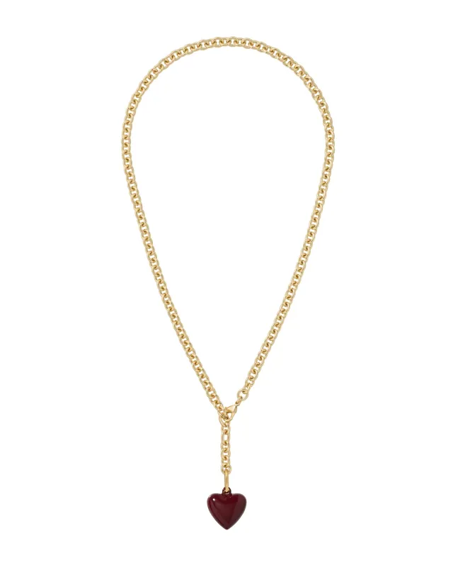 The Mini Puffy Heart Charm Necklace sold by Roxanne Assoulin