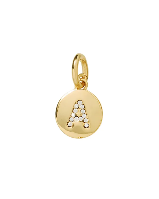 The Pavé Initial Disc Charm sold by Roxanne Assoulin