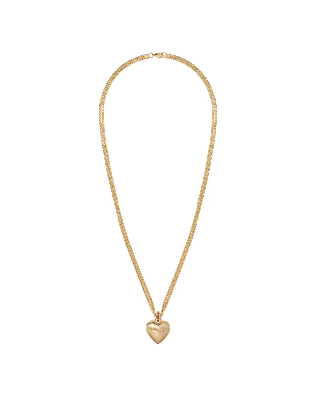 The Mini Florentine Heart Pendant sold by Roxanne Assoulin