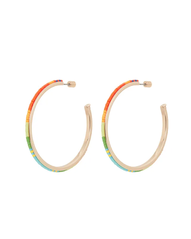 The Big Squeeze Large Hoop Earrings sold by Roxanne Assoulin