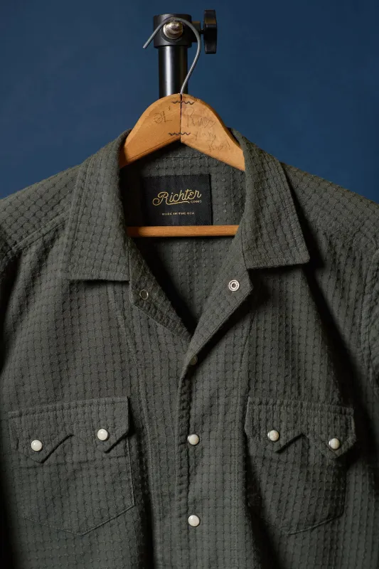 Bishop Open Collar in Hunter Green sold by Richter Goods