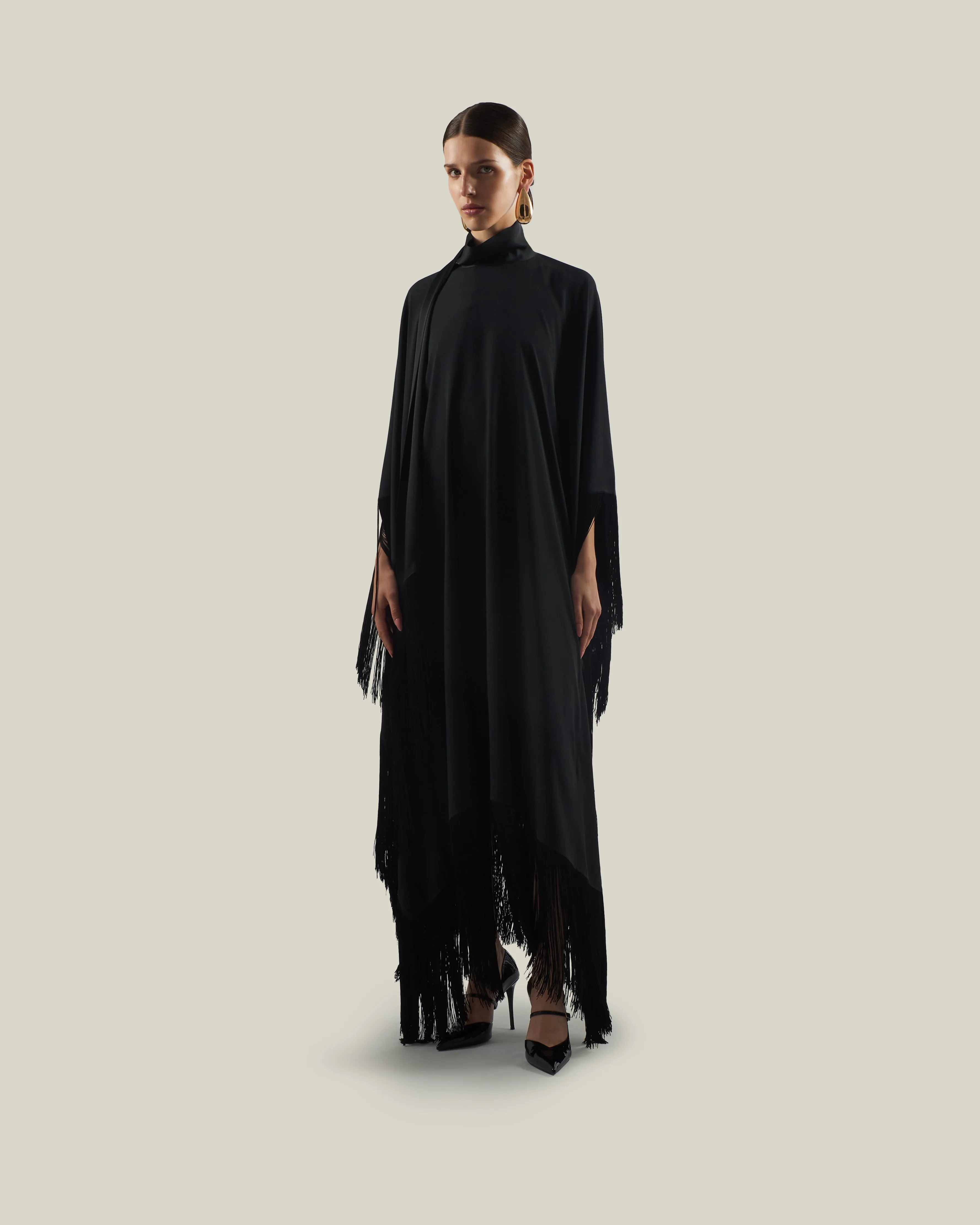Mrs Ross Kaftan in Black sold by Taller Marmo