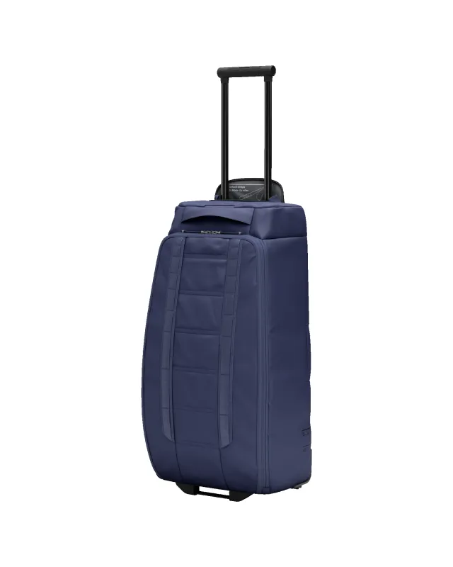 Hugger Roller Bag Check-in 60L Blue Hour made by Dooney & Bourke