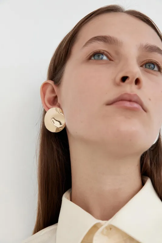 Dented Medallion Earrings - Gold made by Nina Gordon