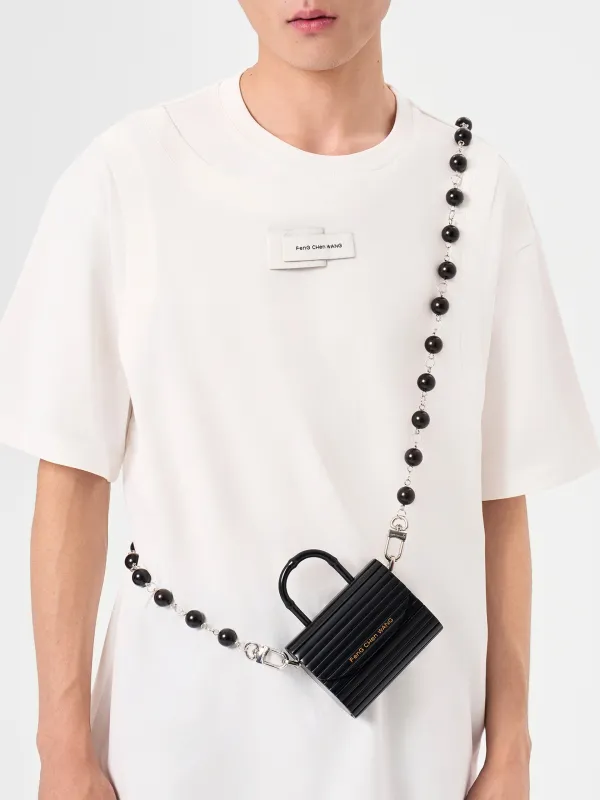 SMALL BLACK BRUSHED BAMBOO FLAP BAG WITH WOODEN BEAD STRAP made by Feng Chen Wang
