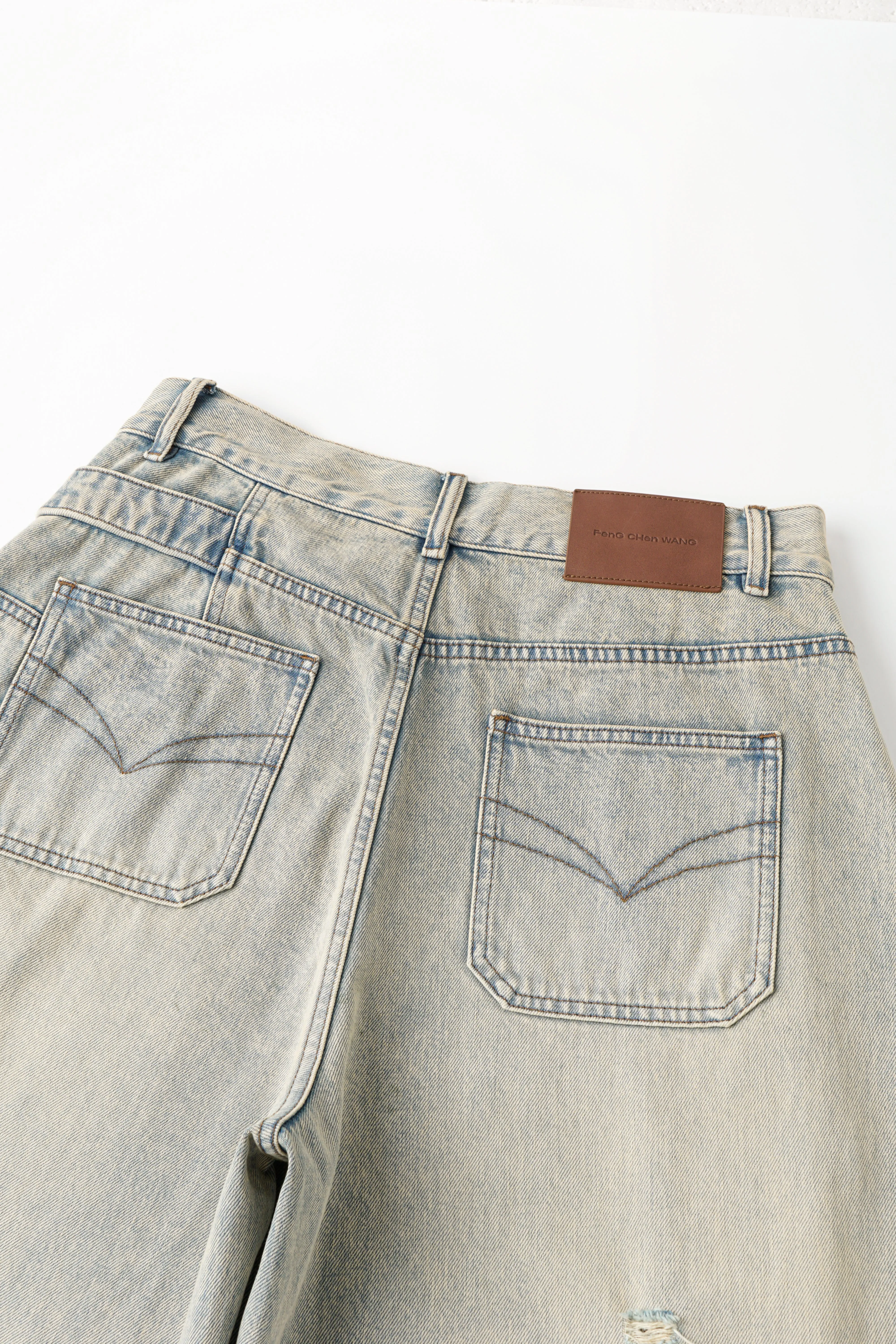 VINTAGE LIGHT BLUE WASHED DECONSTRUCTED DENIM PANTS sold by Feng Chen Wang product image thumbnail 4