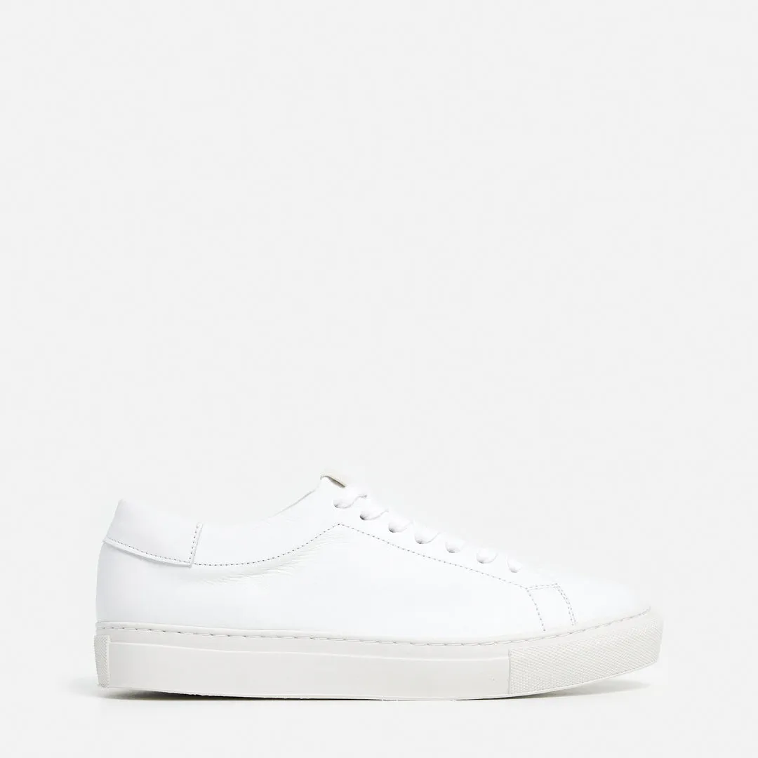 Stockholm Leather White sold by Flattered