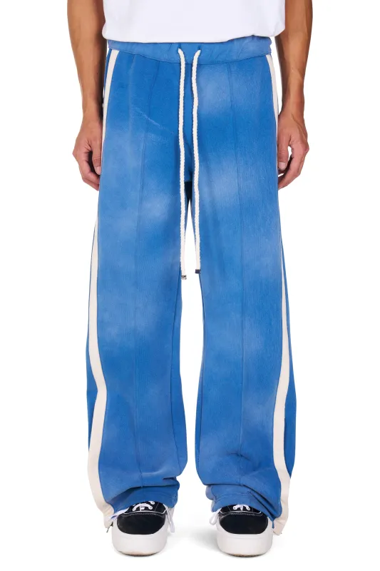 Heavy Cotton Track Pant in Worn Blue made by Nahmias