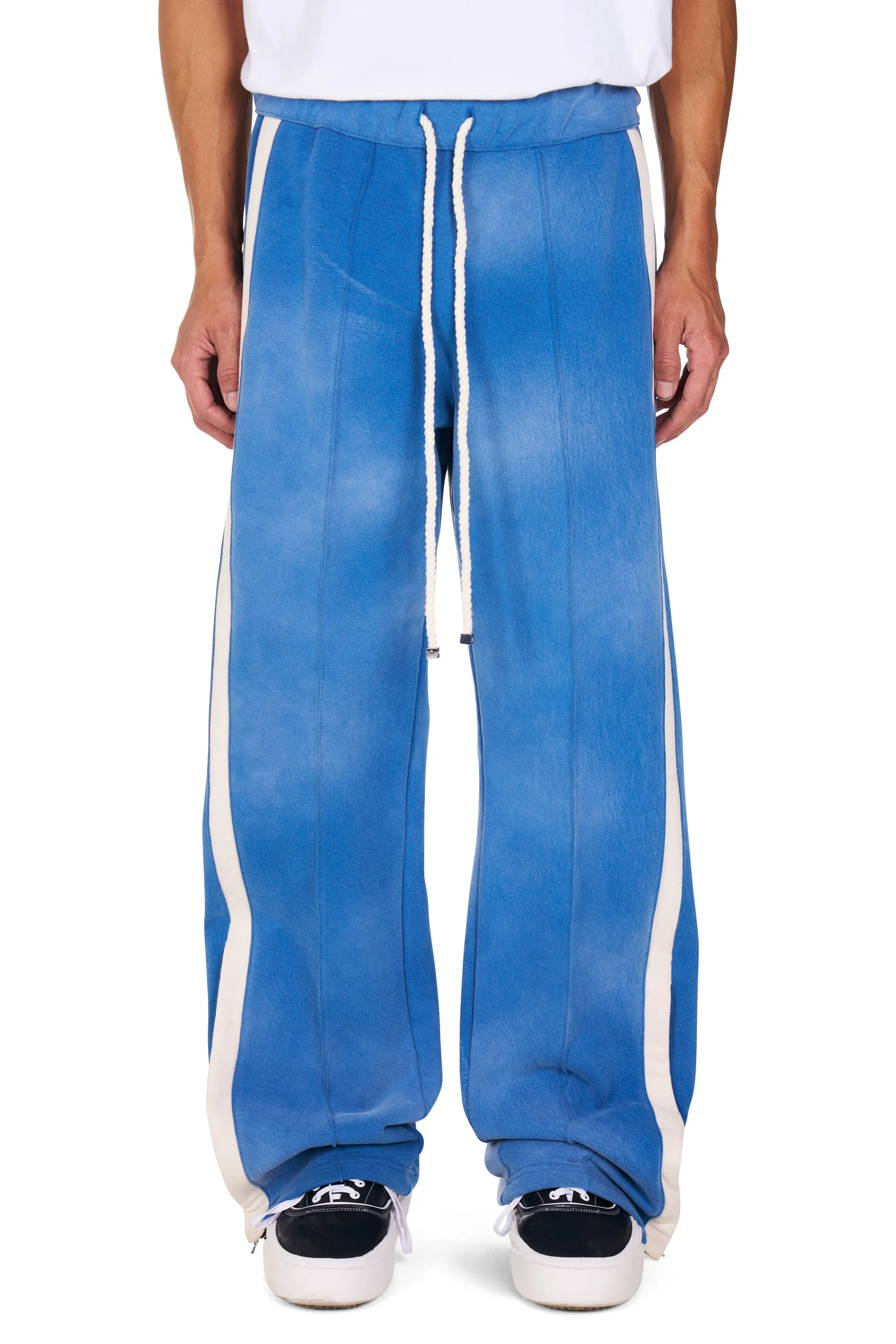 Heavy Cotton Track Pant in Worn Blue sold by Nahmias