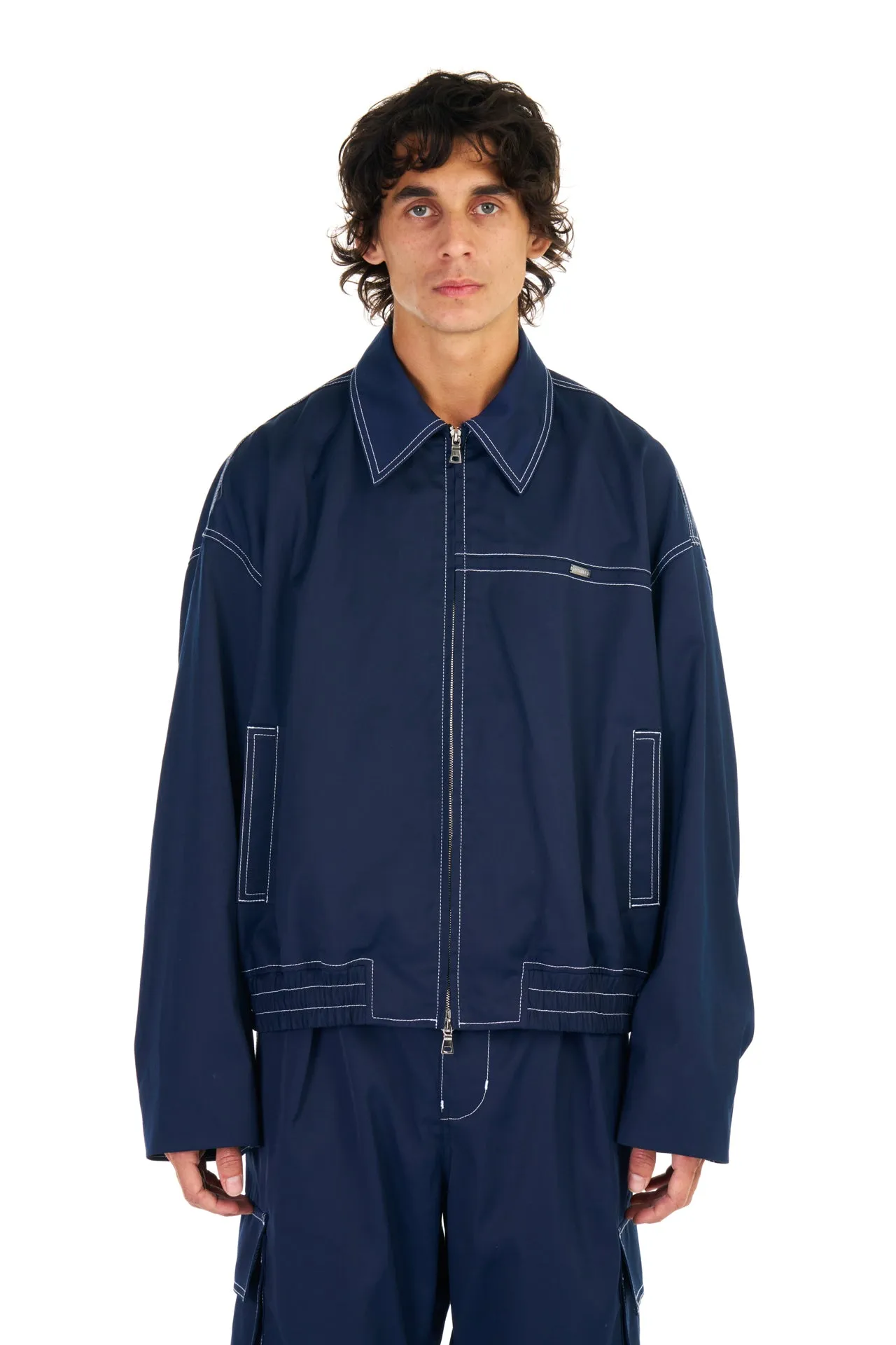 Tech Twill Coach Jacket in Navy sold by Nahmias