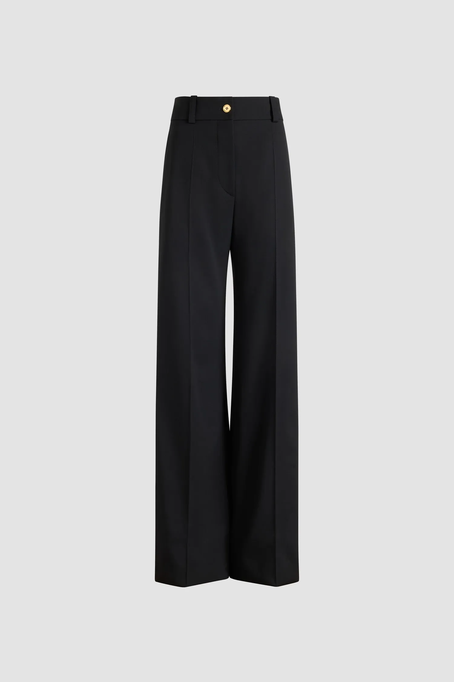 Flared tailored trousers in sustainable technical wool sold by Patou