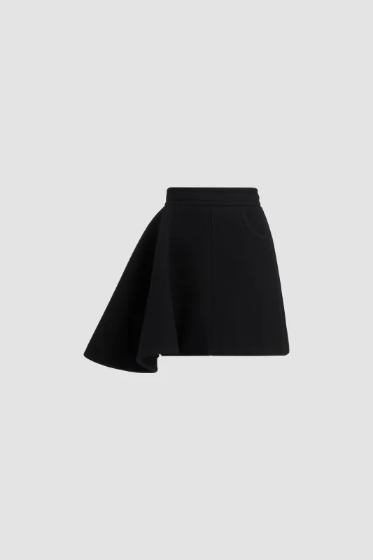 Asymmetric mini skirt in sustainable wool blend made by Patou