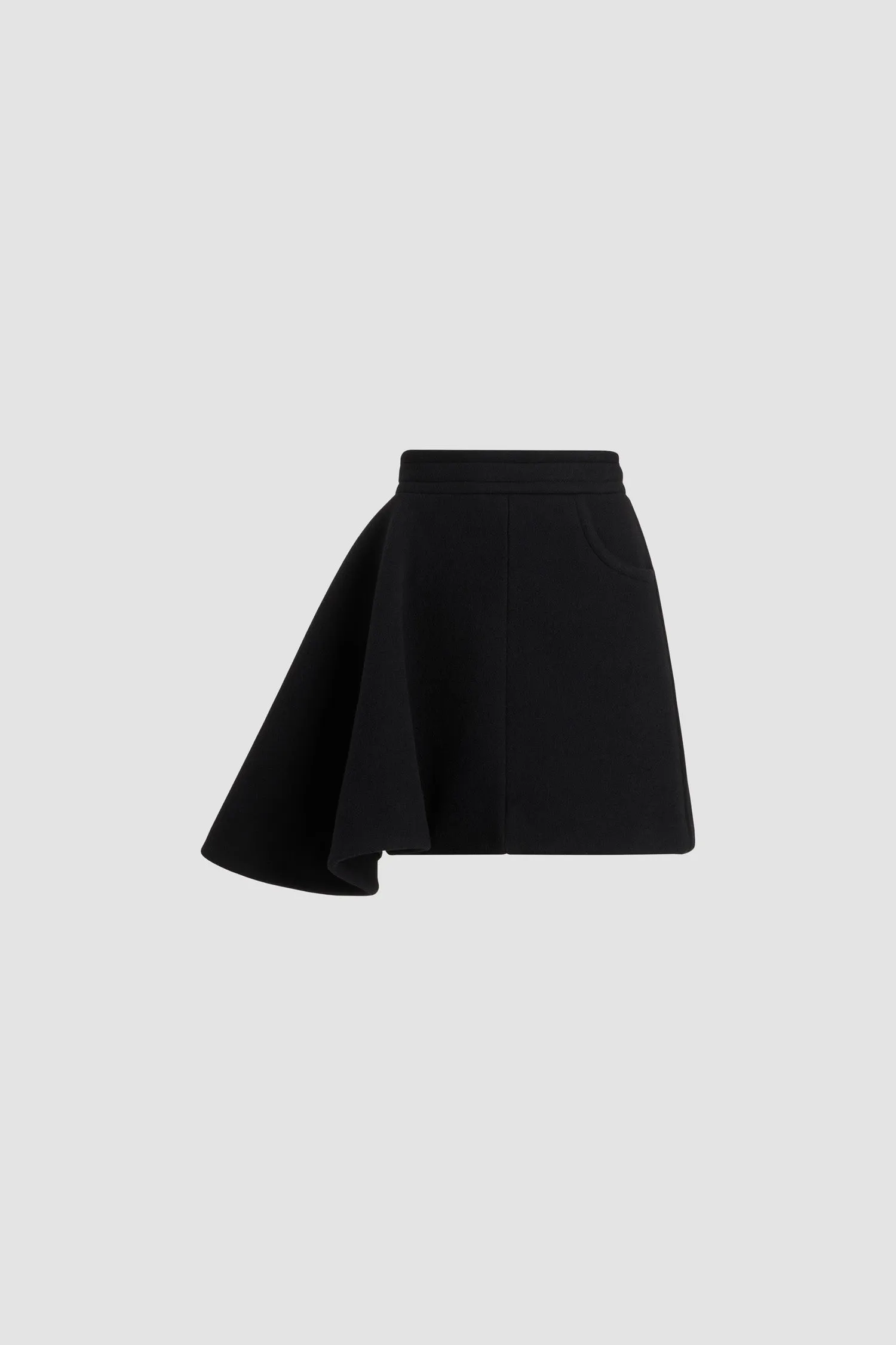Asymmetric mini skirt in sustainable wool blend sold by Patou