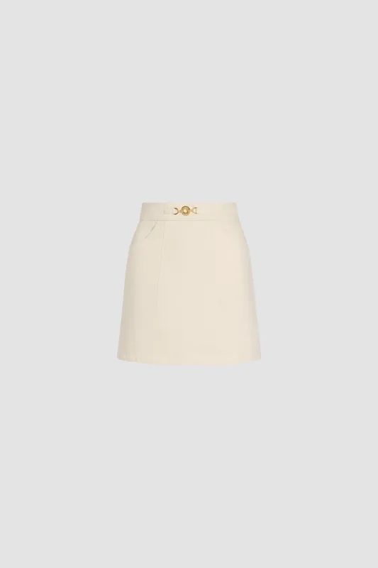 A-line mini skirt in denim made by Patou