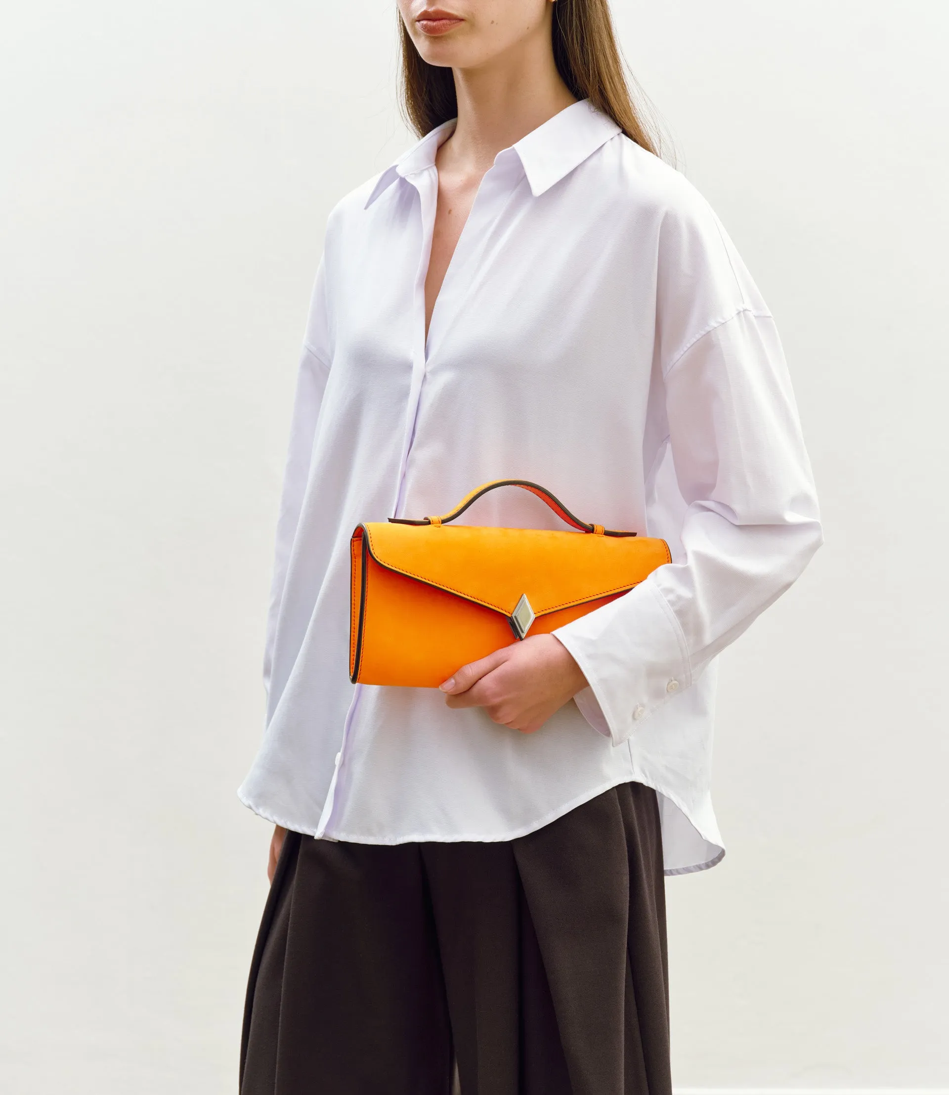 Edge Clutch Nubuck Tangerine sold by Metier product image thumbnail 2