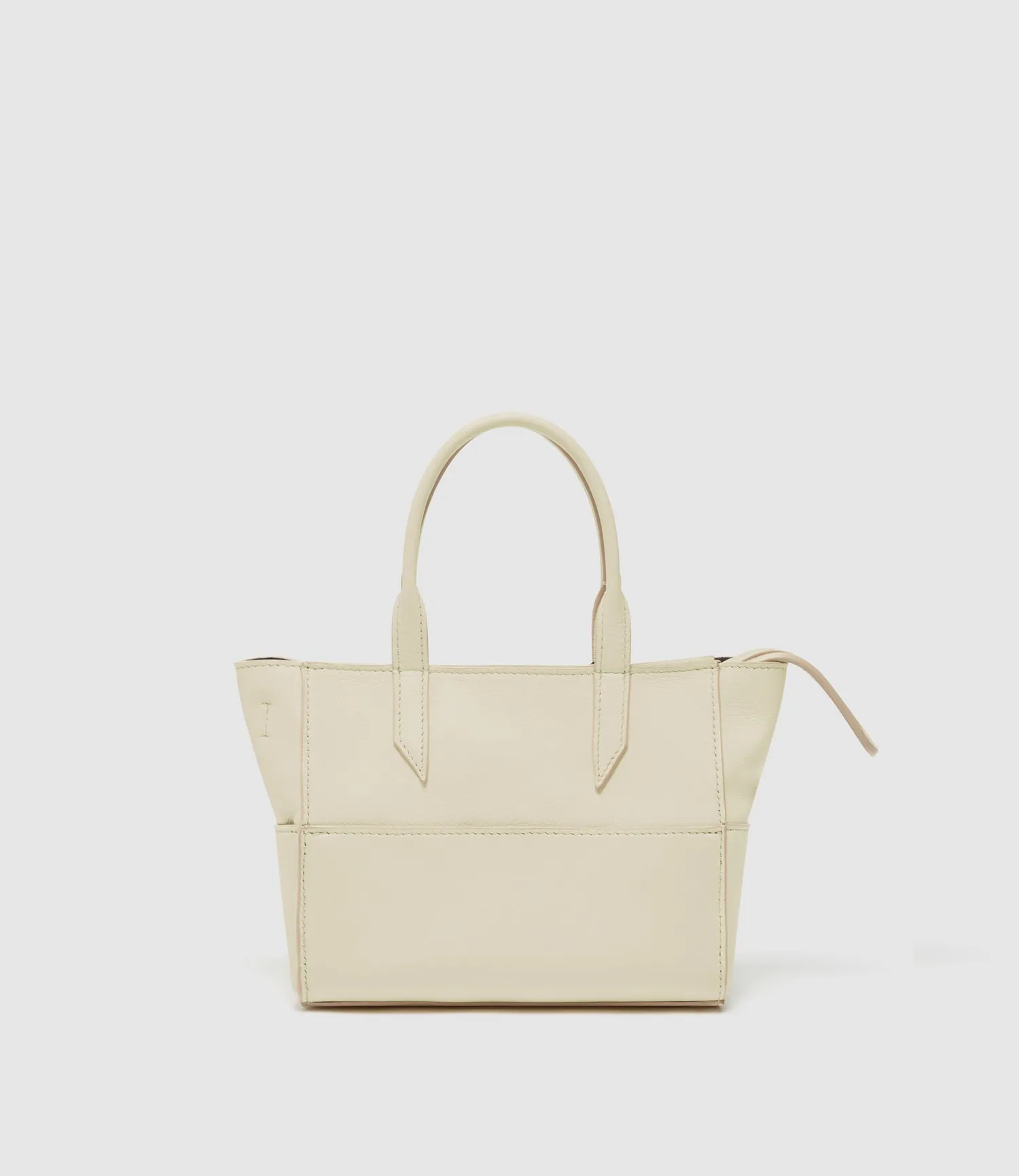 Incognito 20 Smooth Calfskin White Sand sold by Metier