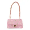 Women's Quilted Flower Shoulder Bag sold by Giant Tiger
