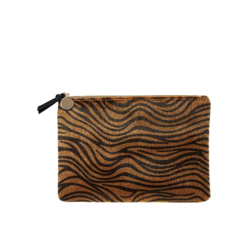 Women's Tiger Print Zippered Clutch sold by Giant Tiger