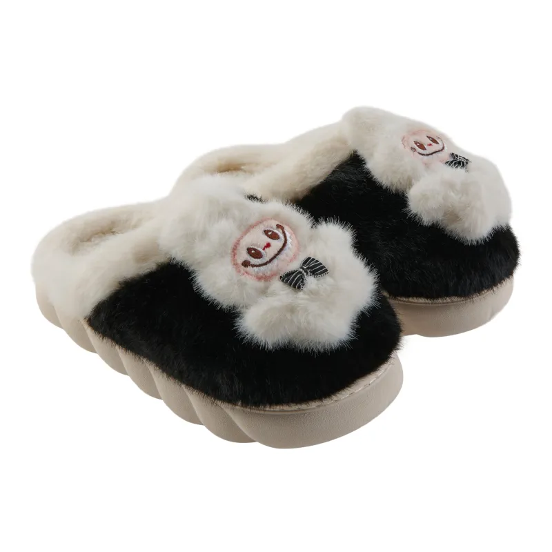 Women's Monster Plush Slippers sold by Giant Tiger