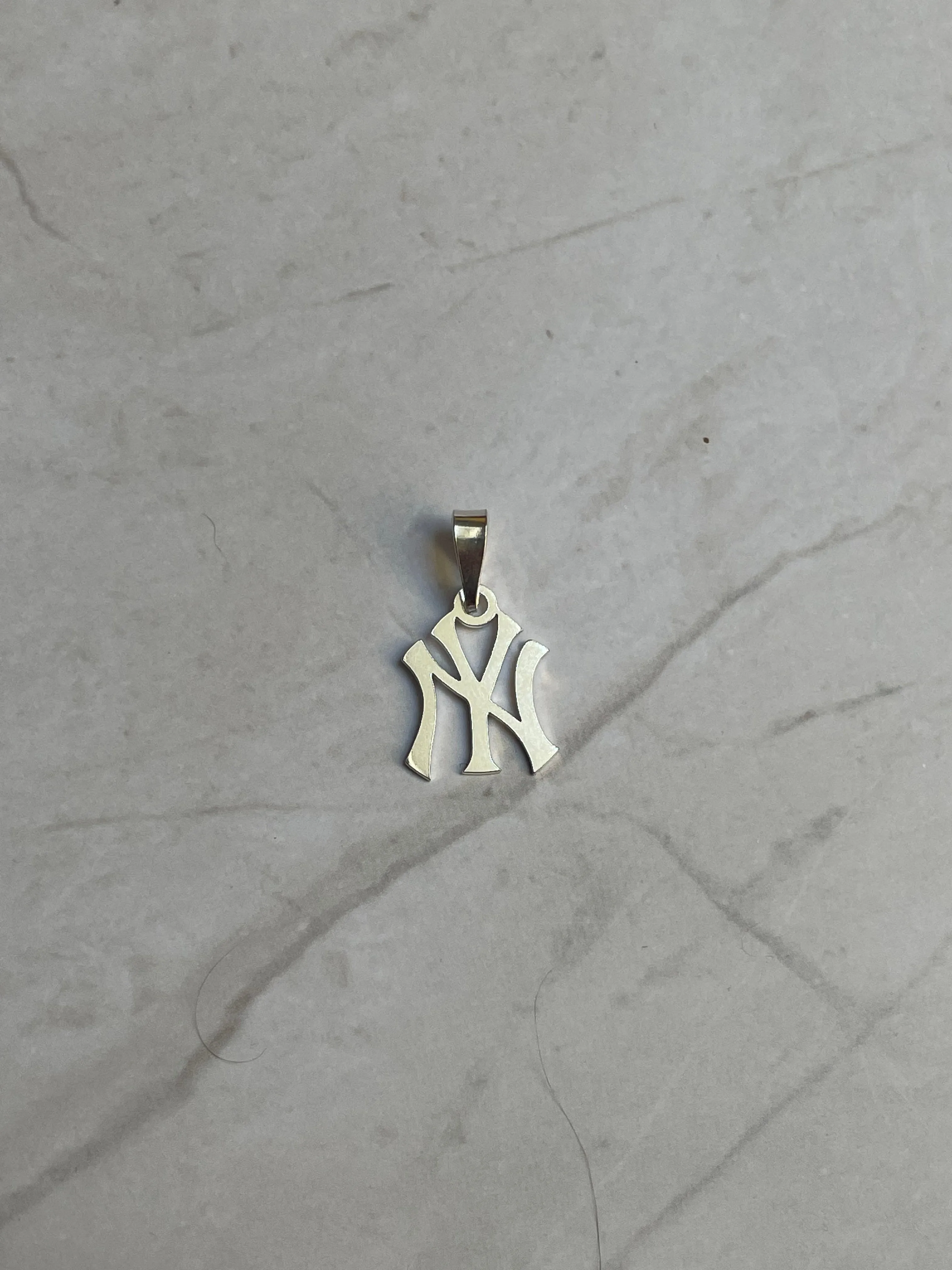 NY Pendant sold by Mary Louis