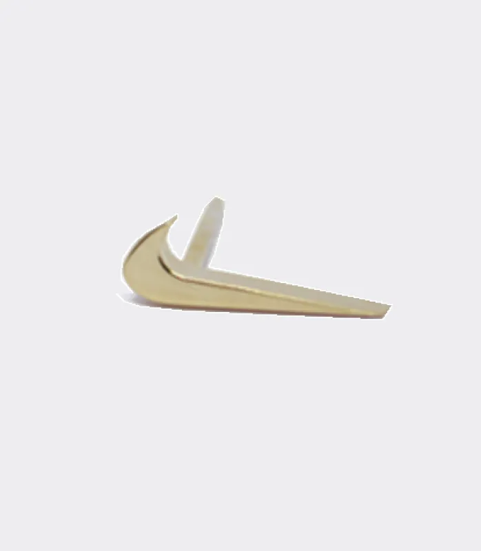 One tiny golden swoosh made by Mary Louis