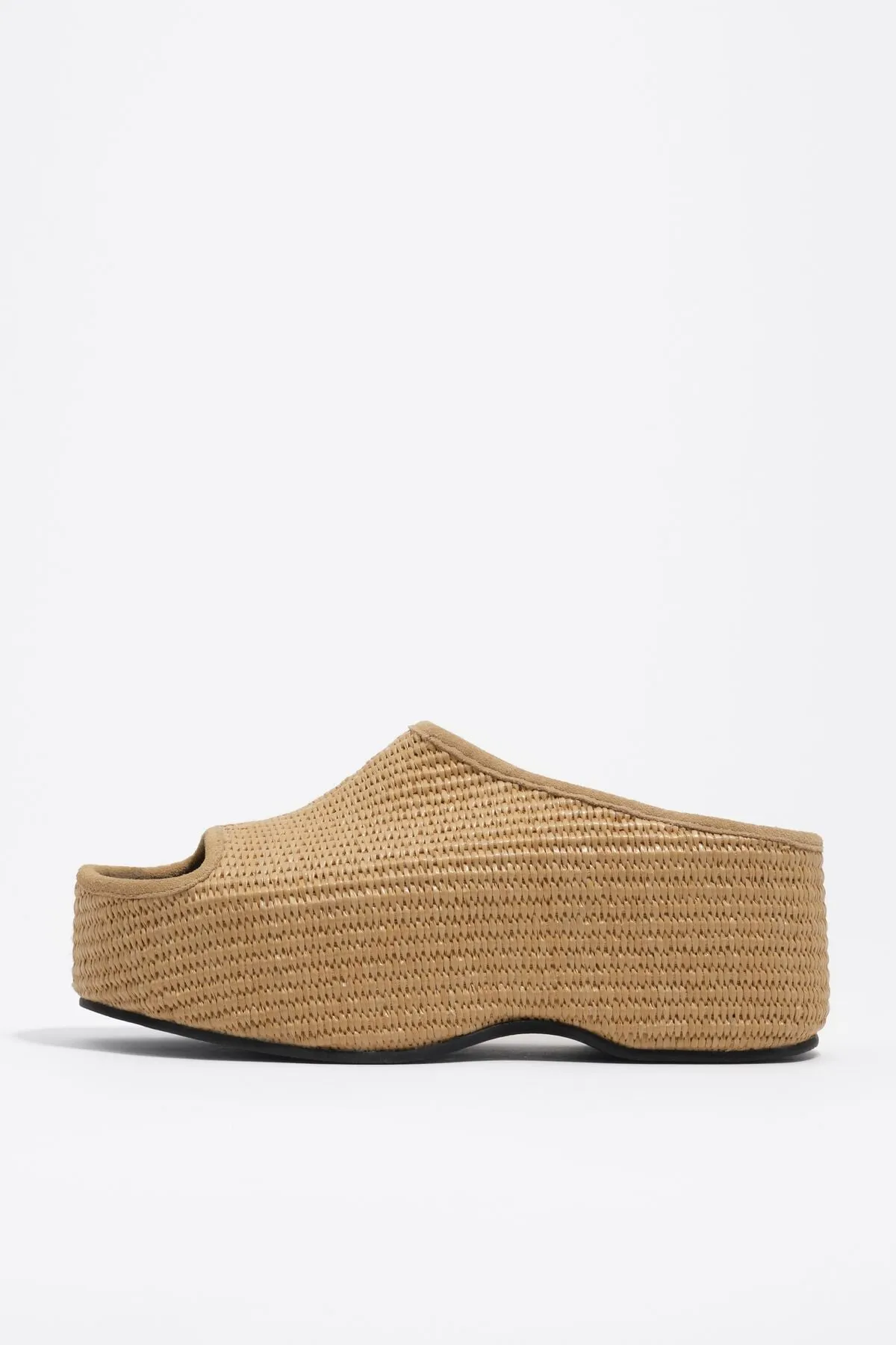Natural raffia platform sandal sold by Bimba y lola