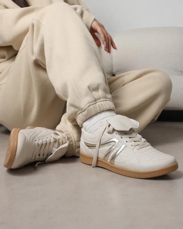 Harri Beige Trainers sold by Simmi London