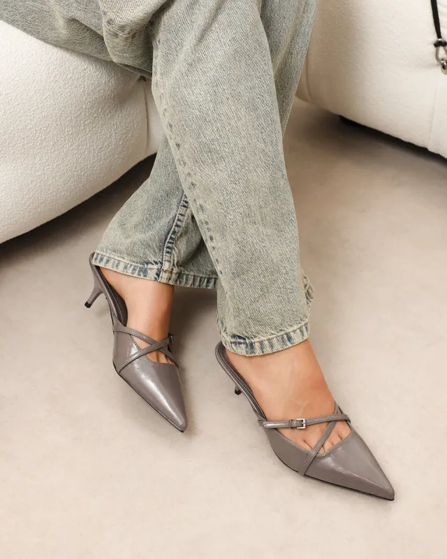 Char grey low heel buckle mules sold by Simmi London