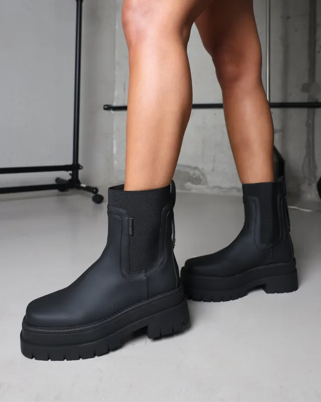 Ansel Black Rubberized Chunky Chelsea Boots sold by Simmi London