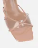 Daisha Nude Patent Clear Heeled Sandals sold by Simmi London