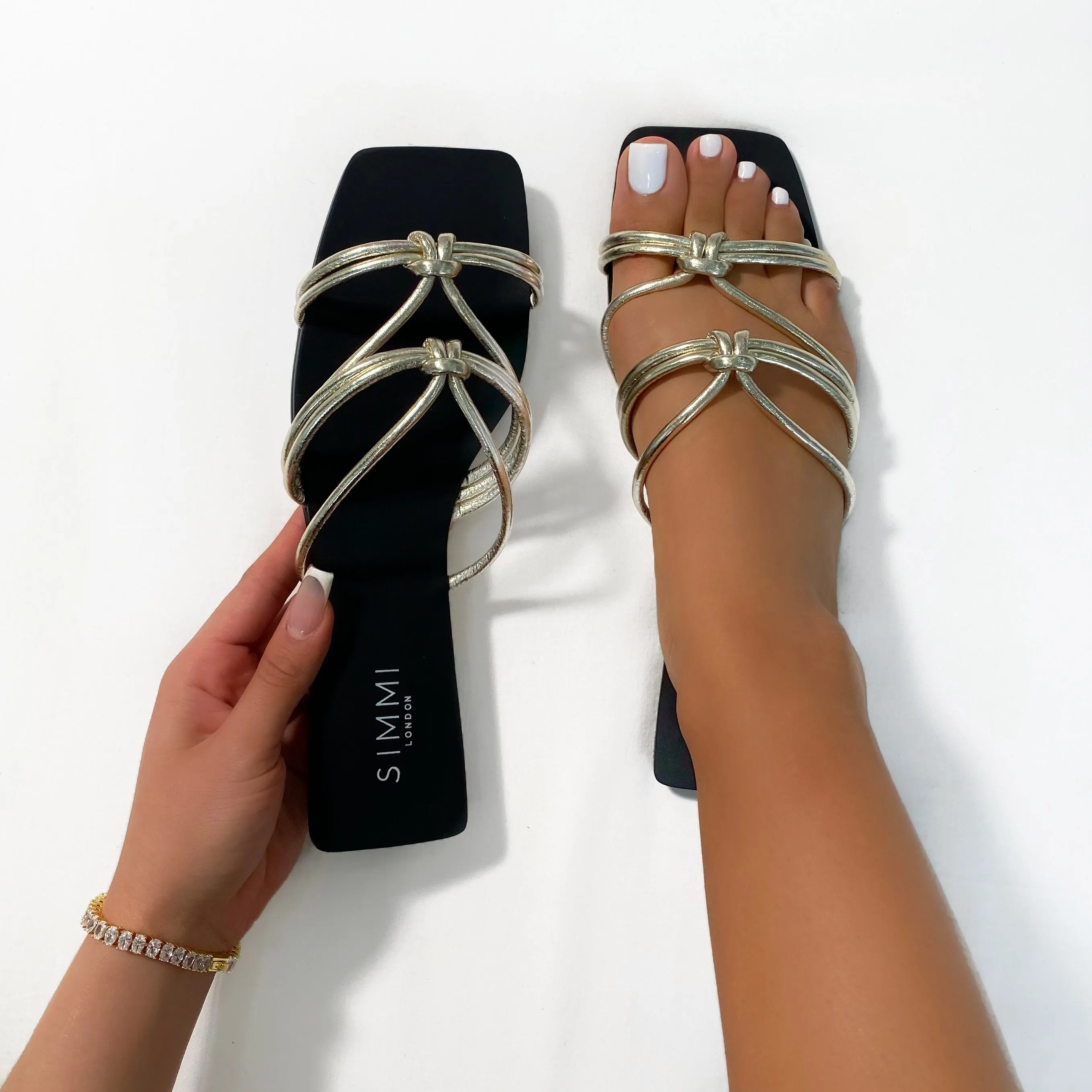 Adalyn Gold Knot Strap Flat Sandals sold by Simmi London