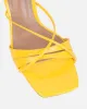Danique Yellow Patent Mules sold by Simmi London