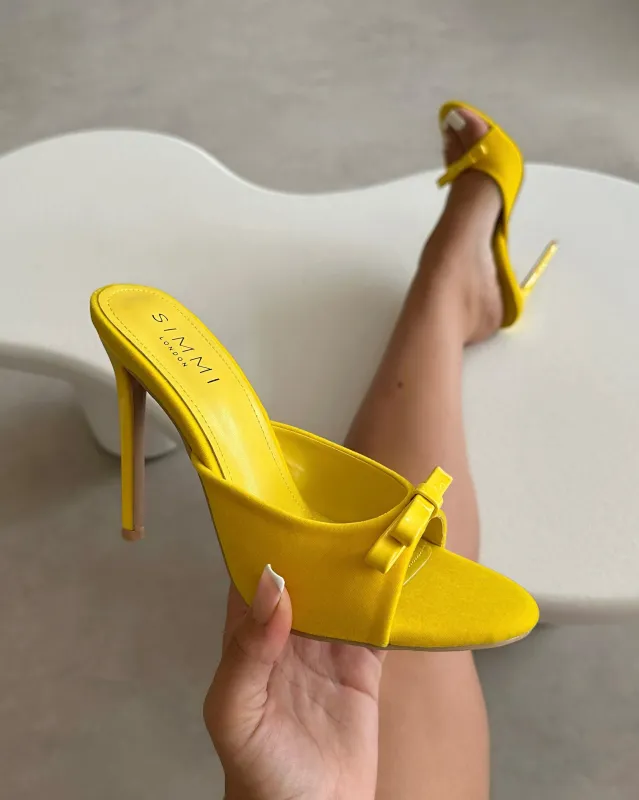 Halima Yellow Suede Bow Detail Heeled Mules sold by Simmi London