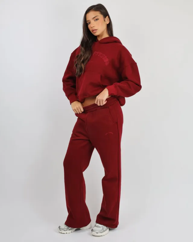 Colby Varsity Flared Joggers in Cranberry sold by Simmi London