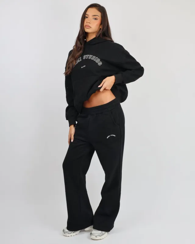 Colby Varsity Flared Joggers in Black sold by Simmi London