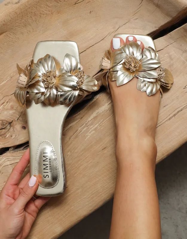 Gilly Gold Metallic Flower Detail Flat Sandals sold by Simmi London