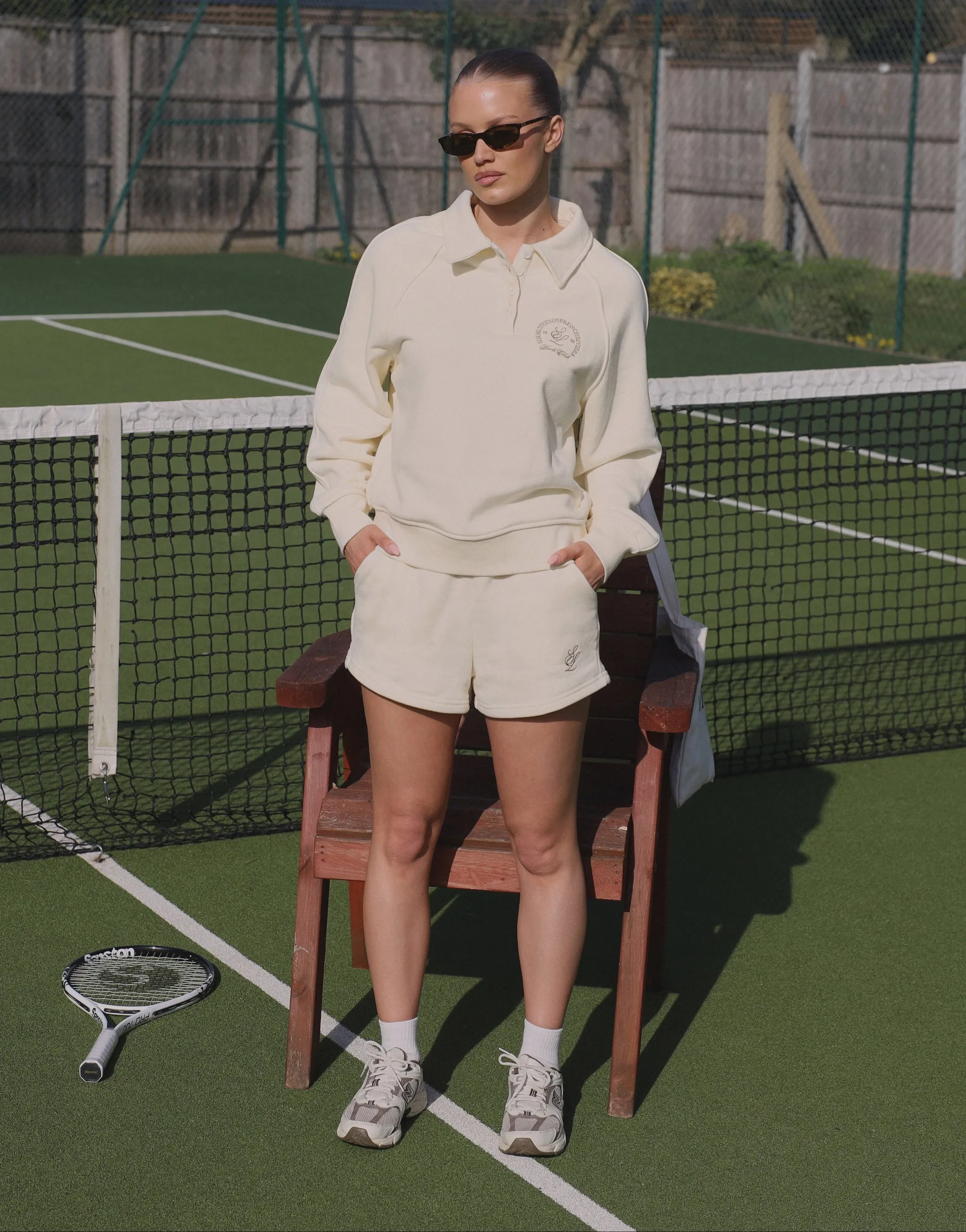 Monaco Simmi Studios Embroidered Logo Polo Sweatshirt In Cream sold by Simmi London