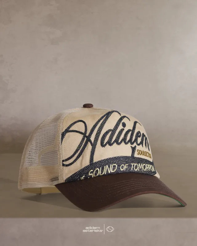 Soulection Capsule - Cursive Trucker Hat sold by Adidem Asterisks