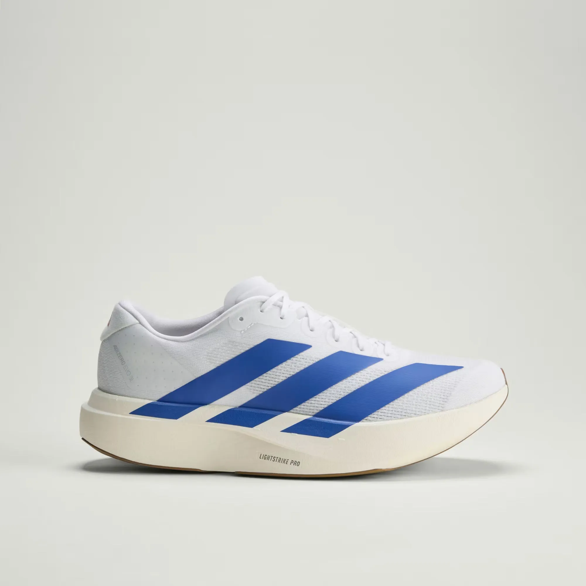 Adidas Men's Adizero Evo SL White Royal Blue Pure Ruby JS4494 sold by Orleans Shoe Co.