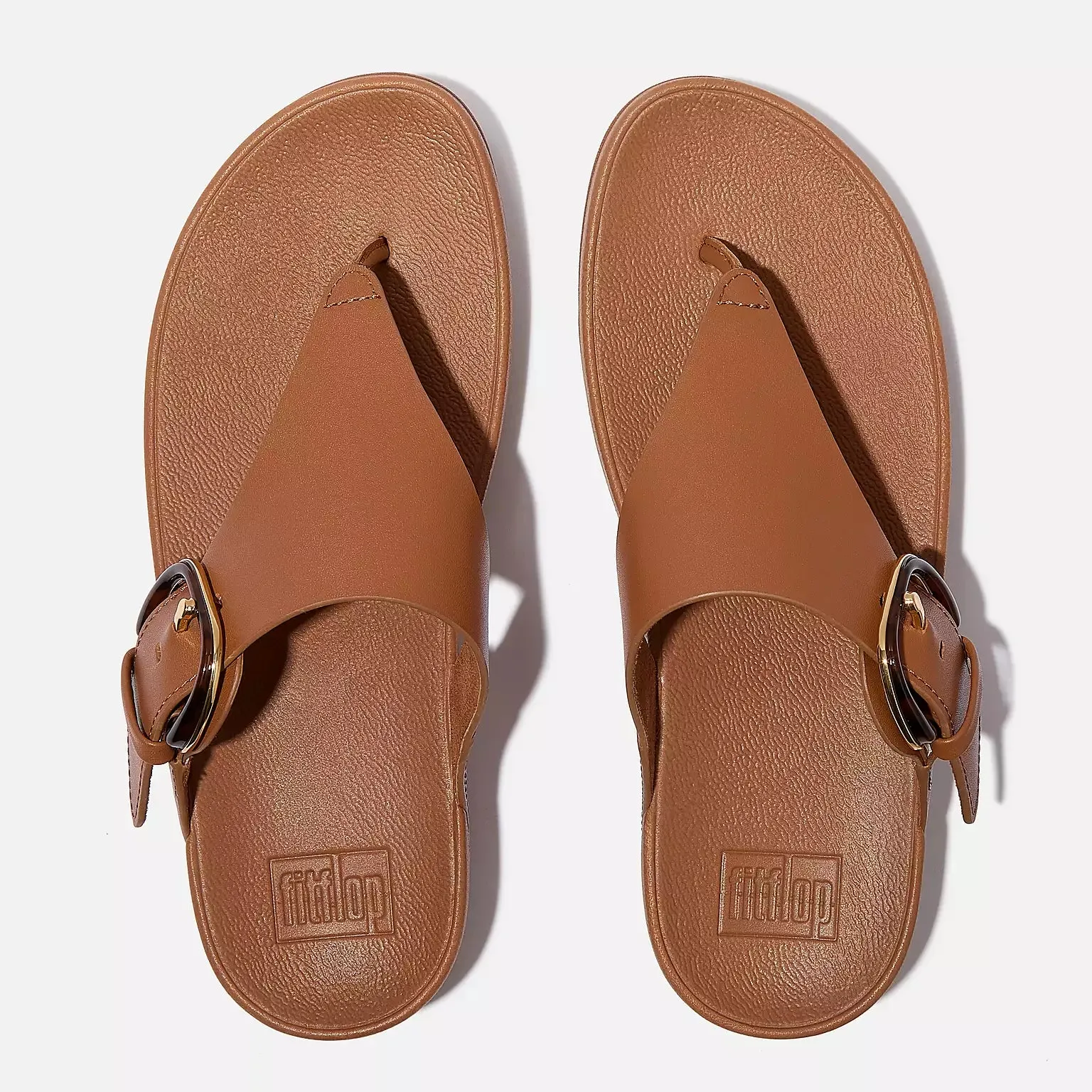 Fit Flop Women's Lulu Resin Buckle Leather Toe Post Sandals Deep Tan sold by Orleans Shoe Co.