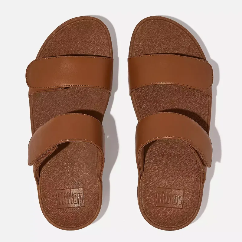 FitFlop Women's Lulu Adjustable Leather Slides Light Tan sold by Orleans Shoe Co.