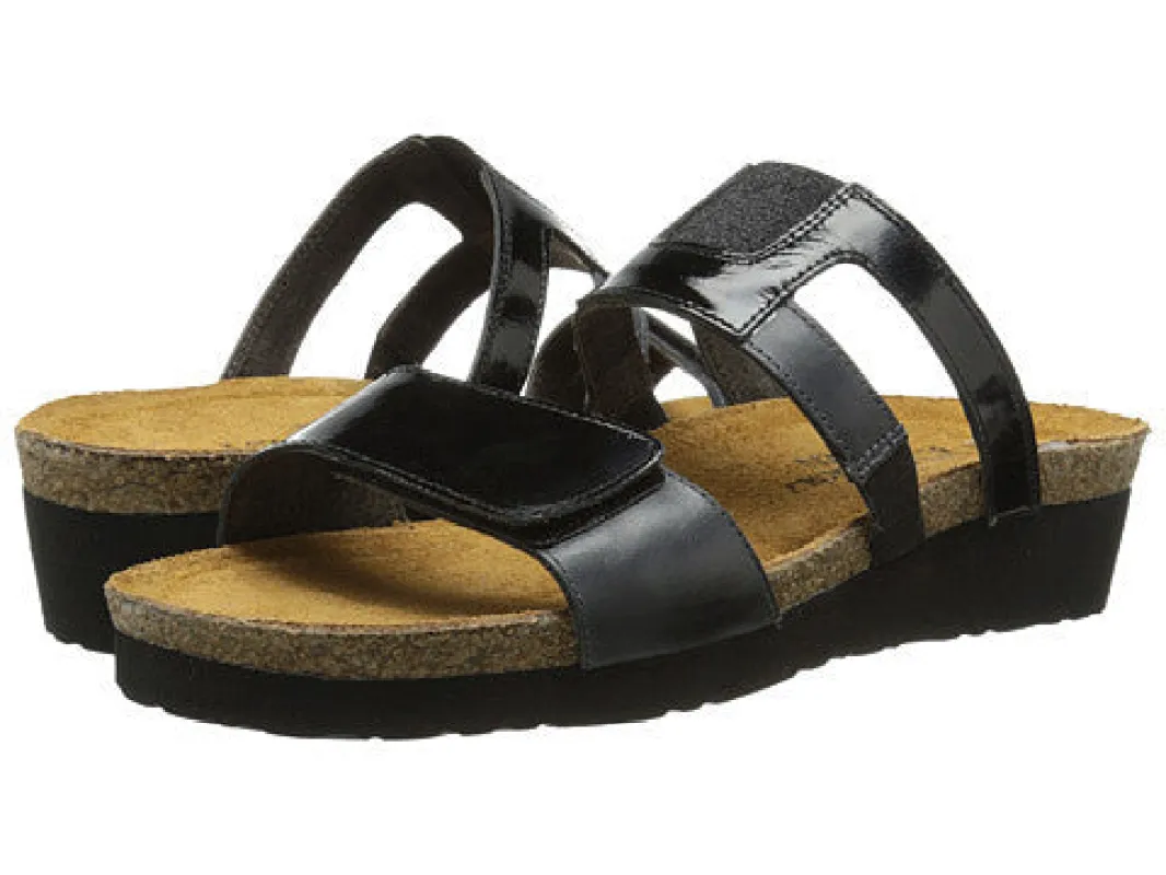 Nancy Wedge Sandal Black sold by Orleans Shoe Co.