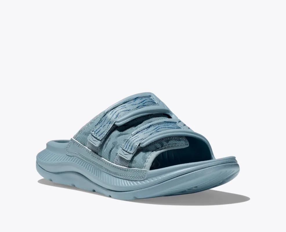 Hoka One One Unisex Ora Luxe Recovery Slide Adjustable Stone Blue steel sold by Orleans Shoe Co.