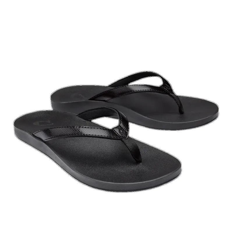 Olukai Women’s Puawe Black Black sold by Orleans Shoe Co.