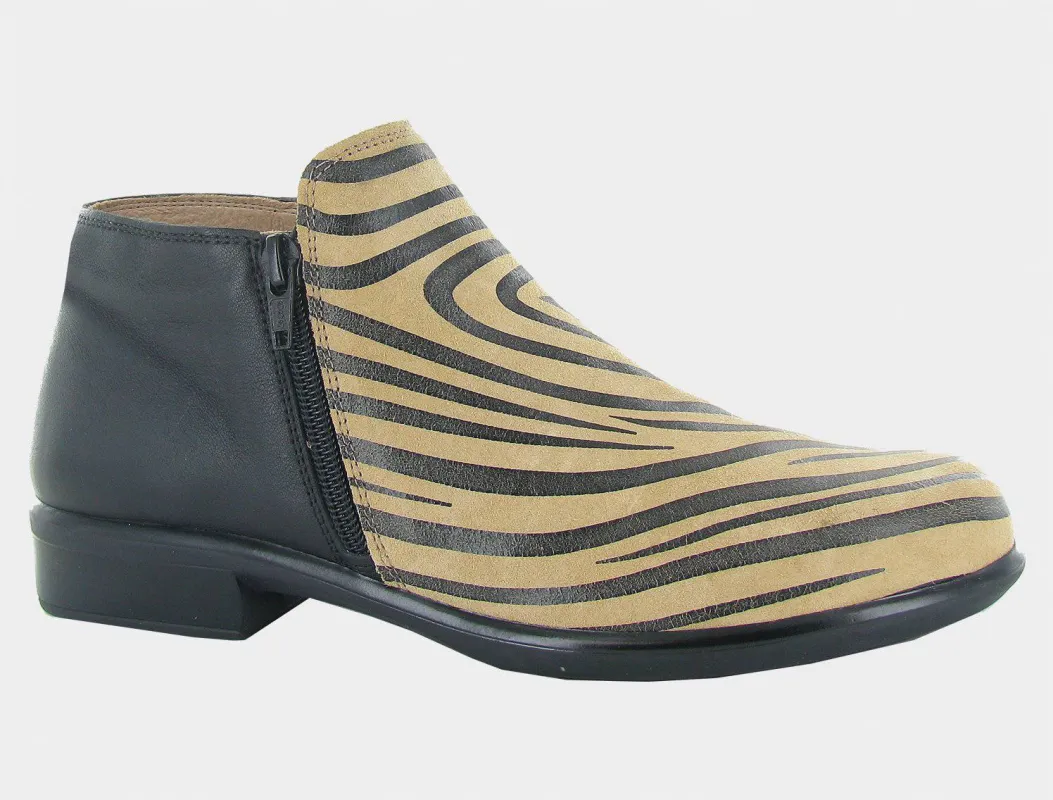 Naot Women's Helm Tan Zebra Black Leather Boots sold by Orleans Shoe Co.
