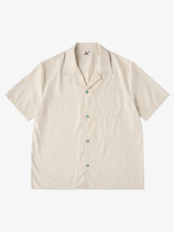 Turquoise Button Peach Skin Shirt sold by Karaku