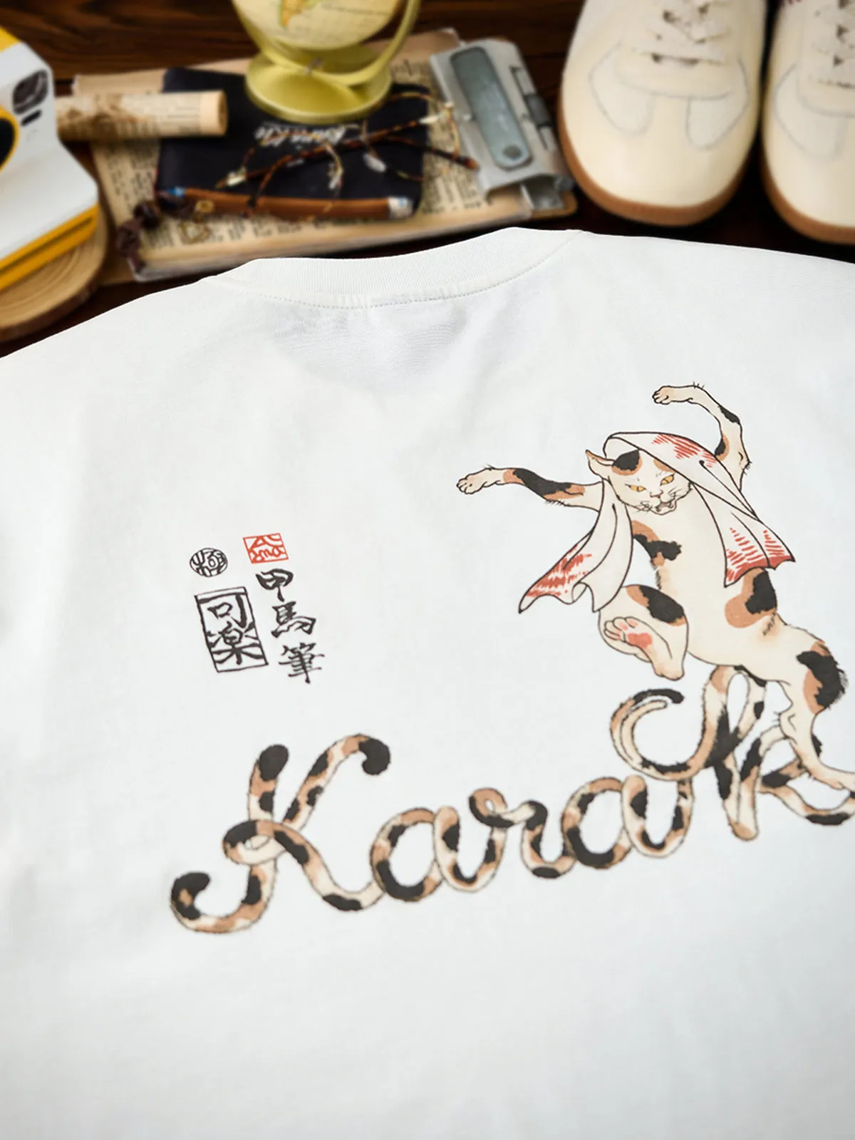KARAKU × Koma “Strange Hundred Monster Stories” Dancing Bakeneko Print & Embroidered Cotton Tee sold by Karaku product image thumbnail 5