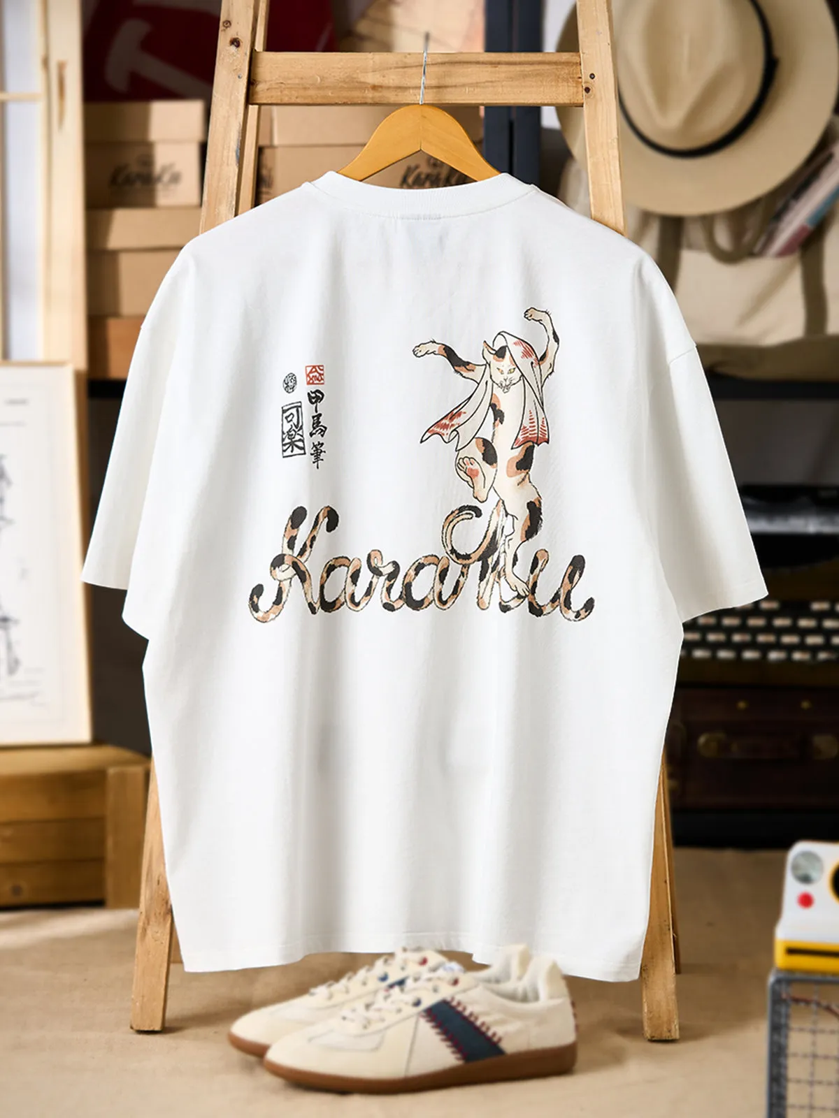 KARAKU × Koma “Strange Hundred Monster Stories” Dancing Bakeneko Print & Embroidered Cotton Tee sold by Karaku product image thumbnail 3